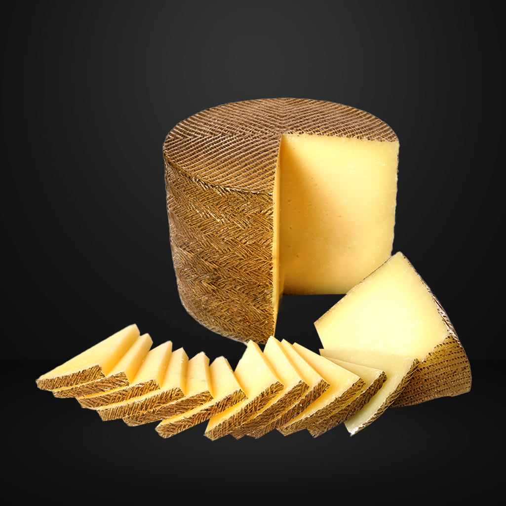 Manchego de Oveja Redonda 1kg. - Distribuidora Qualite